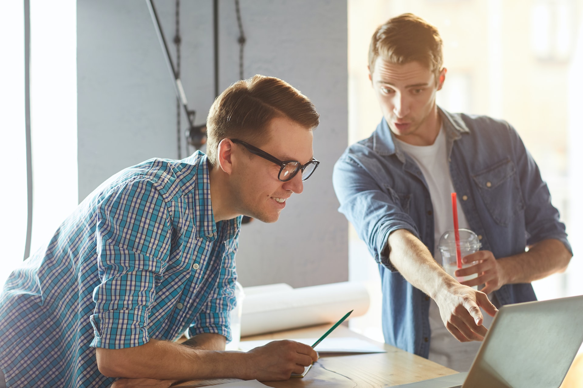 two men securing computer data